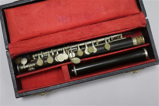 A cased Excelsior piccolo